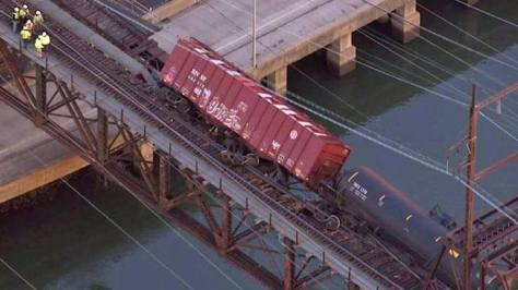 Train loaded with explosive shale oil derails downtown Philly over Schuylkill River near major university and hospital neighborhood